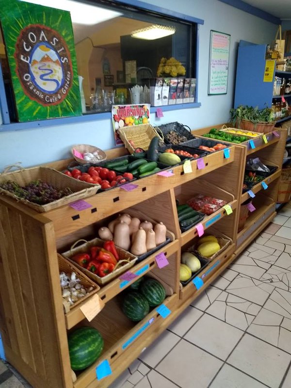 Produce shelves at the Ecoasis market