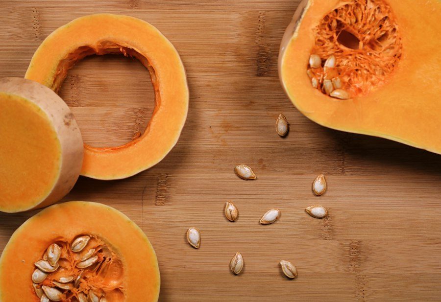 Butternut squash cut open on a board